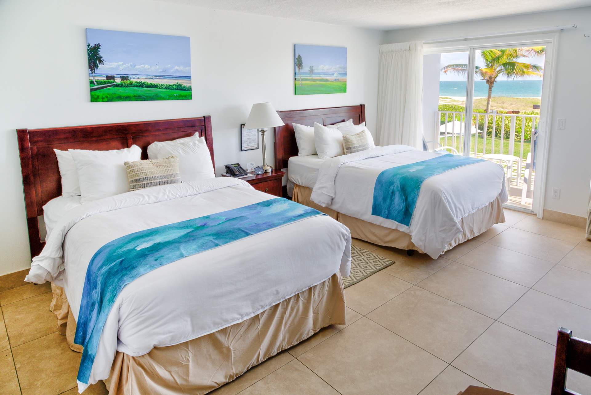 Two bed with outdoor beach view